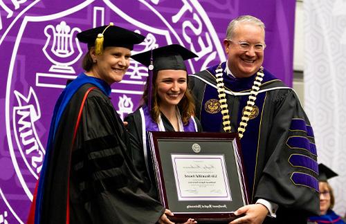 girl graduating with honor's during spring commencement